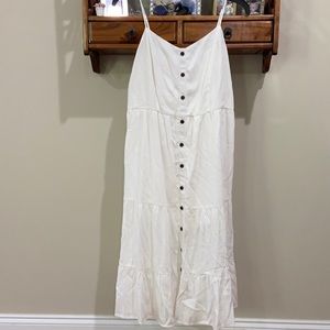 Pink Lily  white dress great classic for your closet.